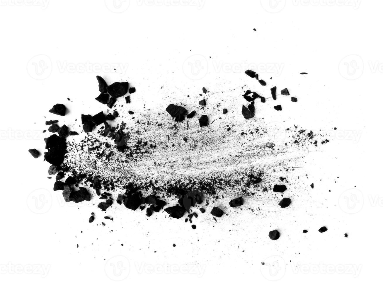 wood charcoal or Coal dust. Black charcoal texture. Black wood charcoal dust isolated on white background photo