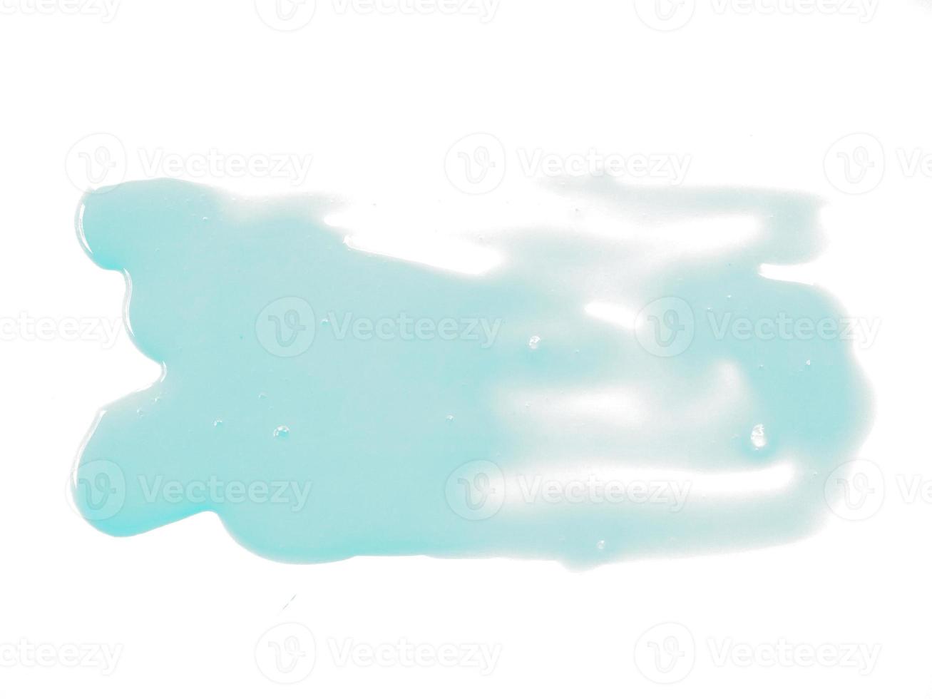 Water on white background. Texture of spilled water. Spilled water