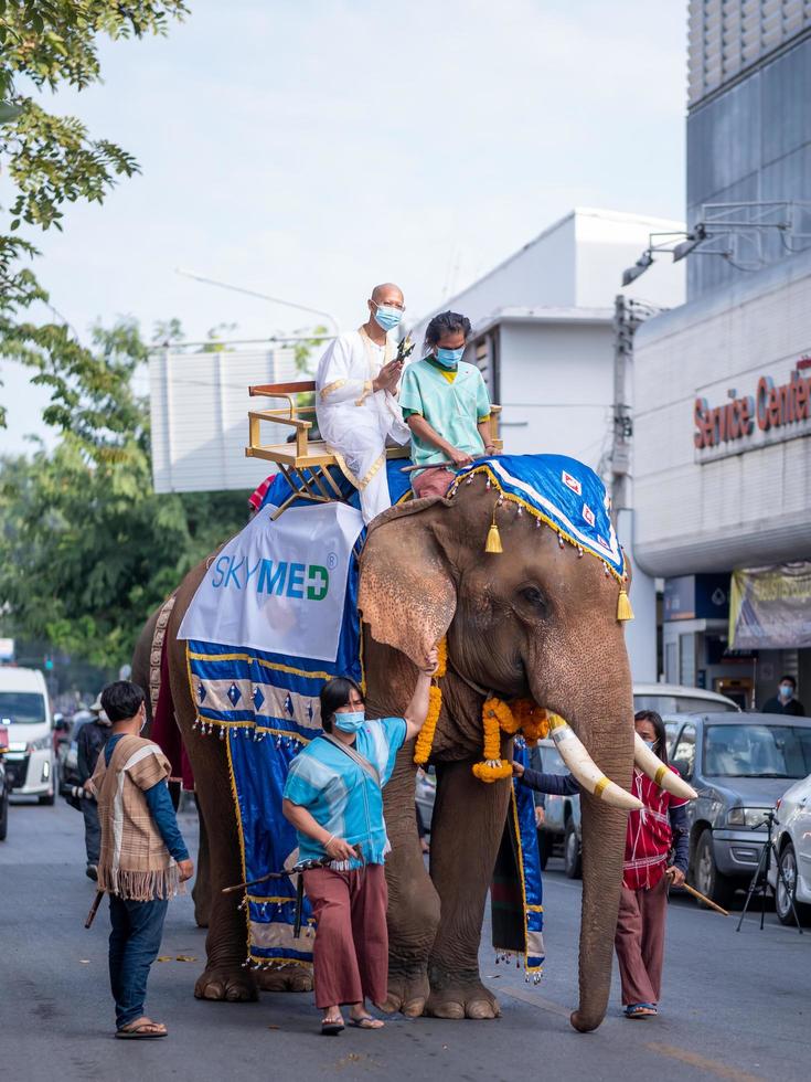 Chiang Mai, Thailand, 2020 - The elephant and people in Buddhist ordination ceremony paraded. photo