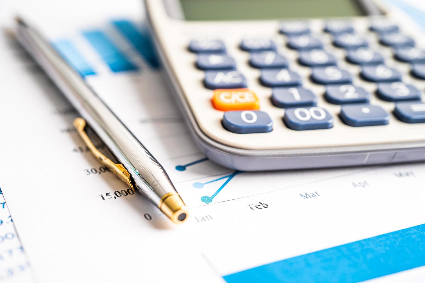 Calculator on graph paper. Finance development, Banking Account, Statistics, Investment Analytic research data economy, Stock exchange trading, Business company concept. photo