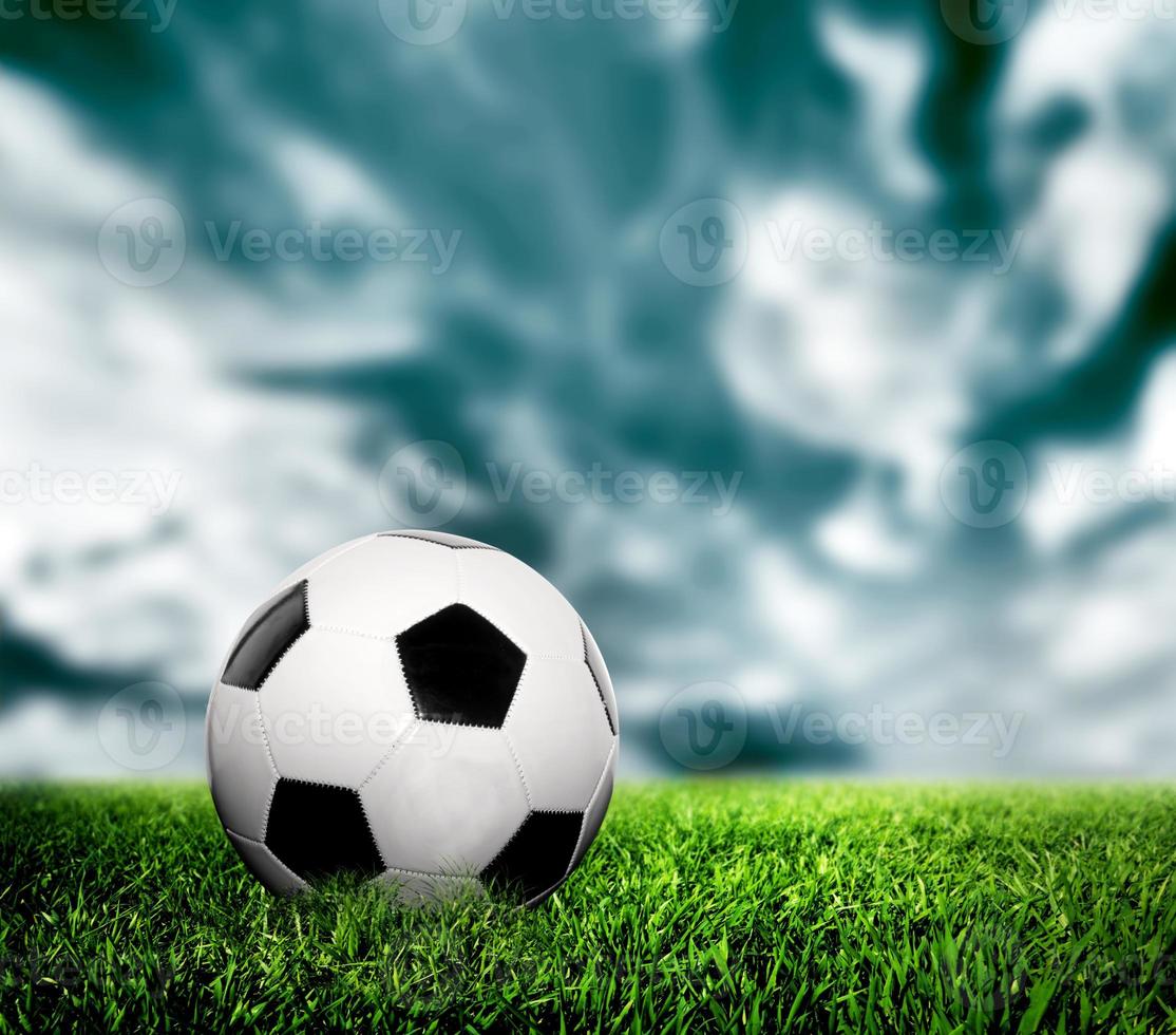 Football, soccer. A leather ball on grass, lawn. photo