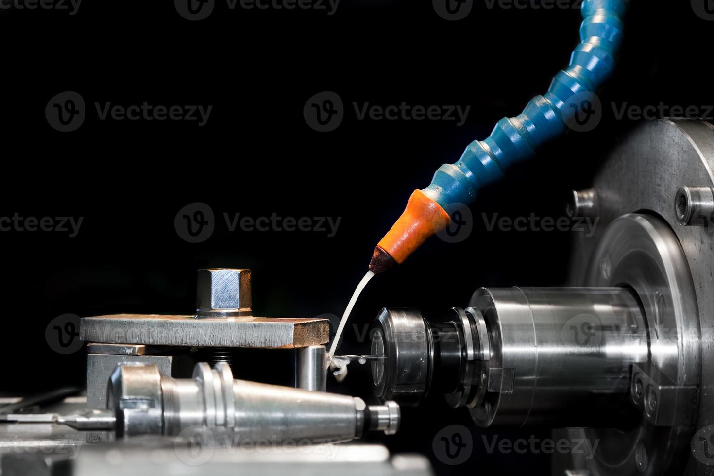 CNC machining station at work. Milling, threading industry. photo