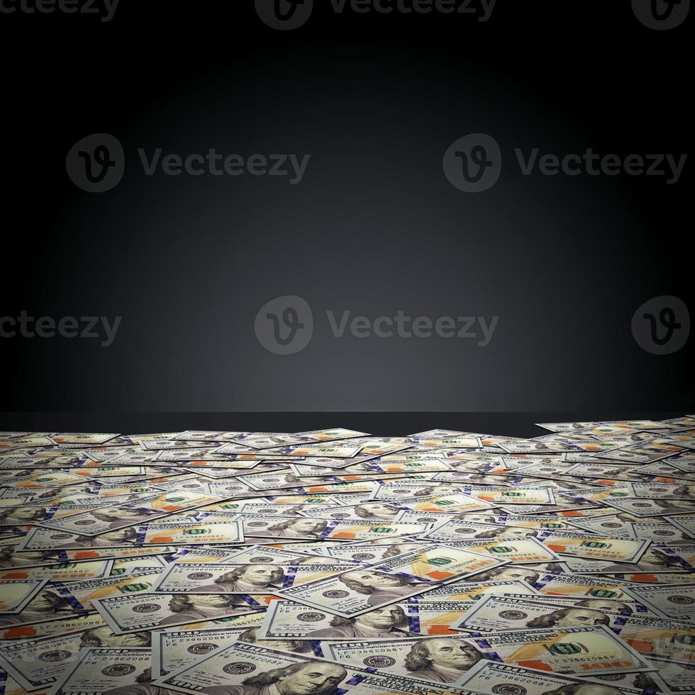 One hundred dollar banknotes against black wall. Money photo