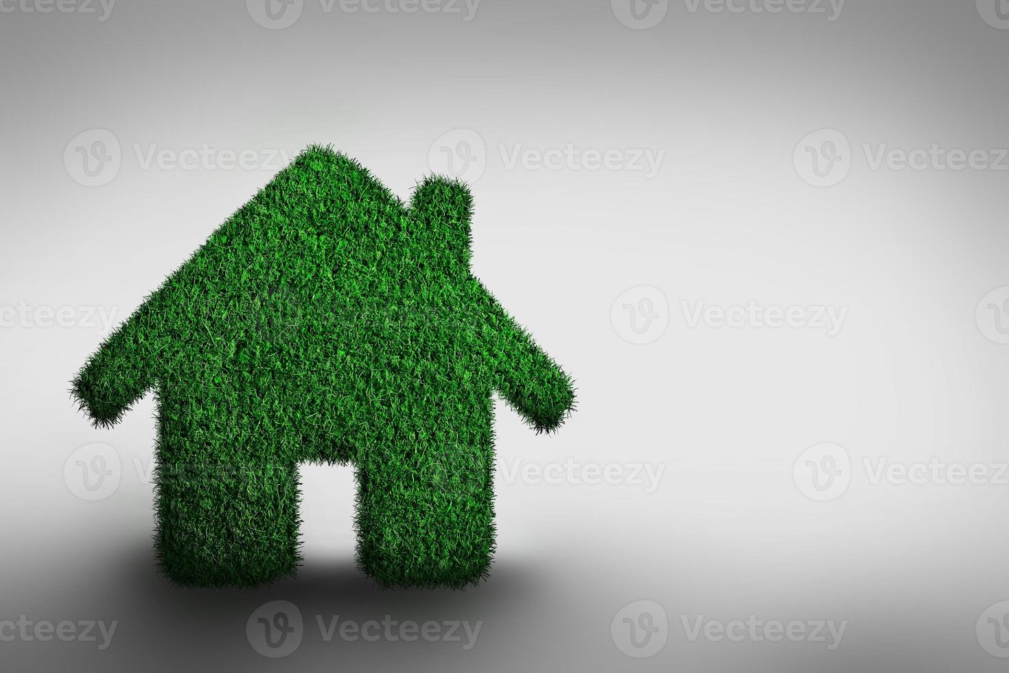 Green house on gray background photo