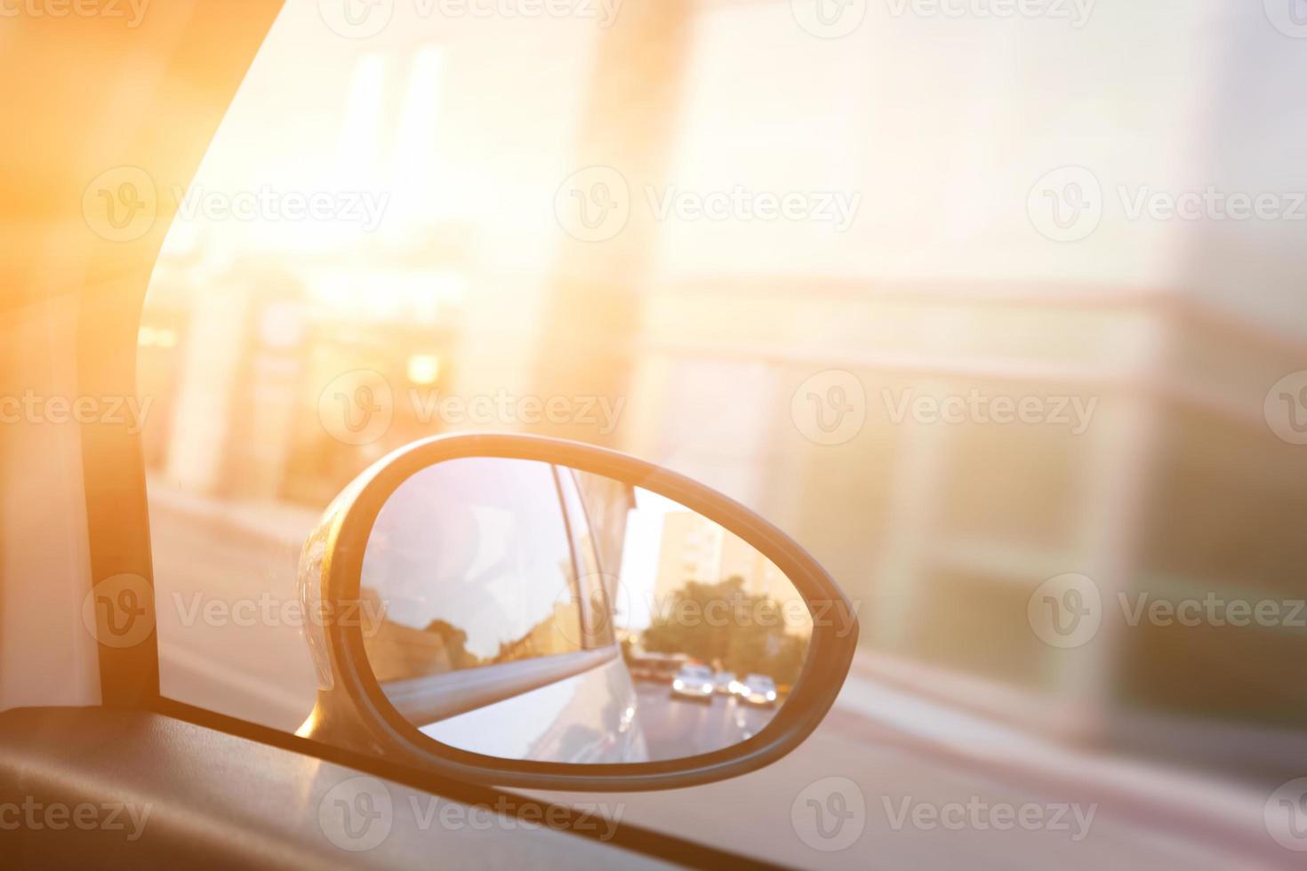Dynamic view from car on the wing mirror during drive photo