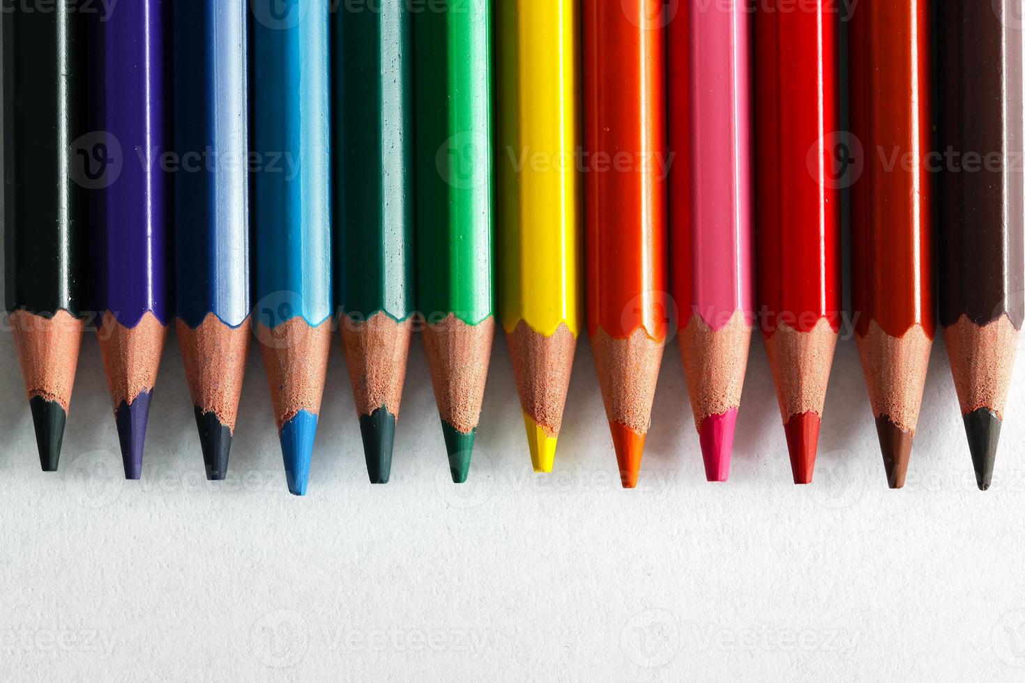 Colorful pencils arranged as a color pallete, isolated. photo