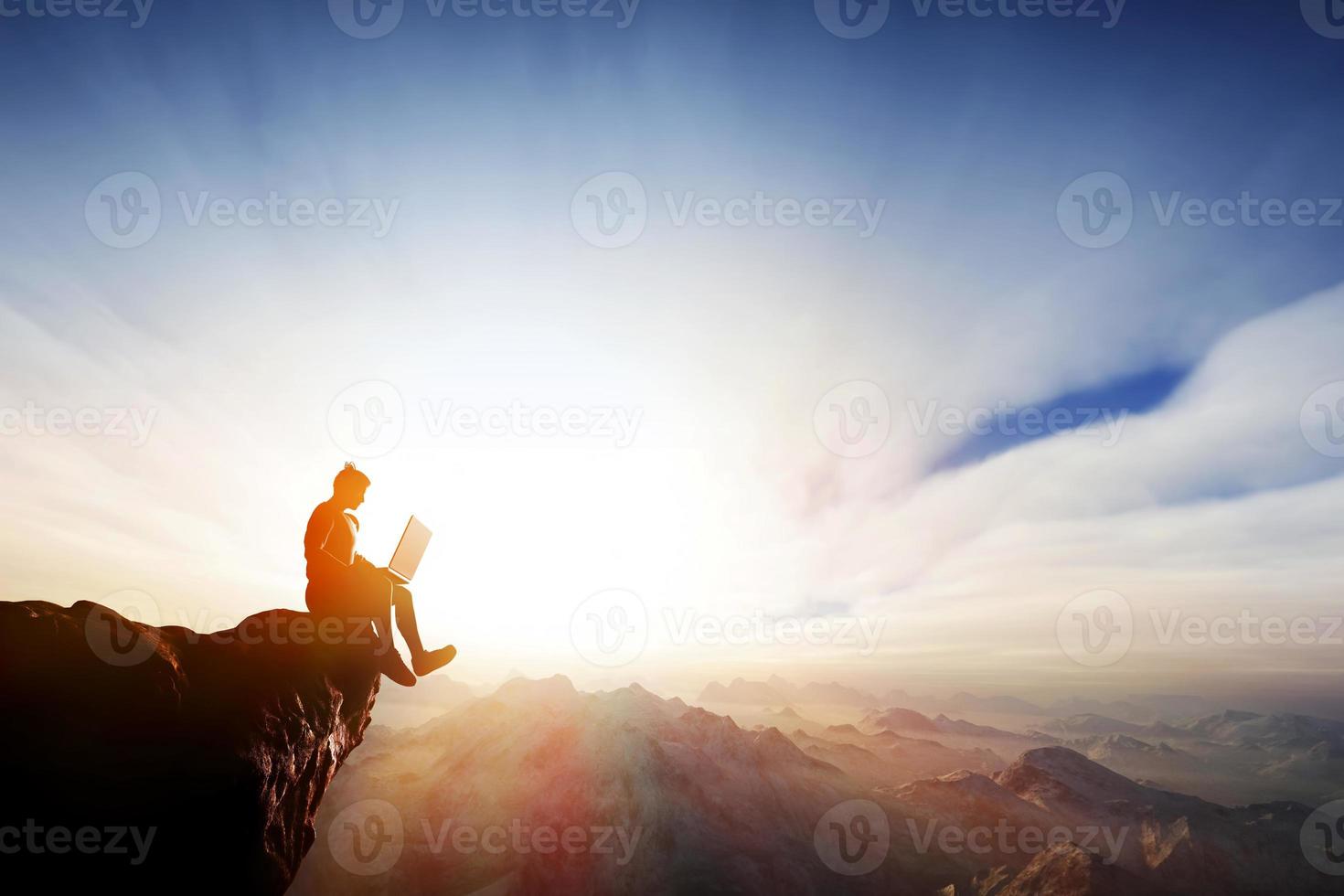 3D Man working on notebook on top of the mountains. Internet freedom photo