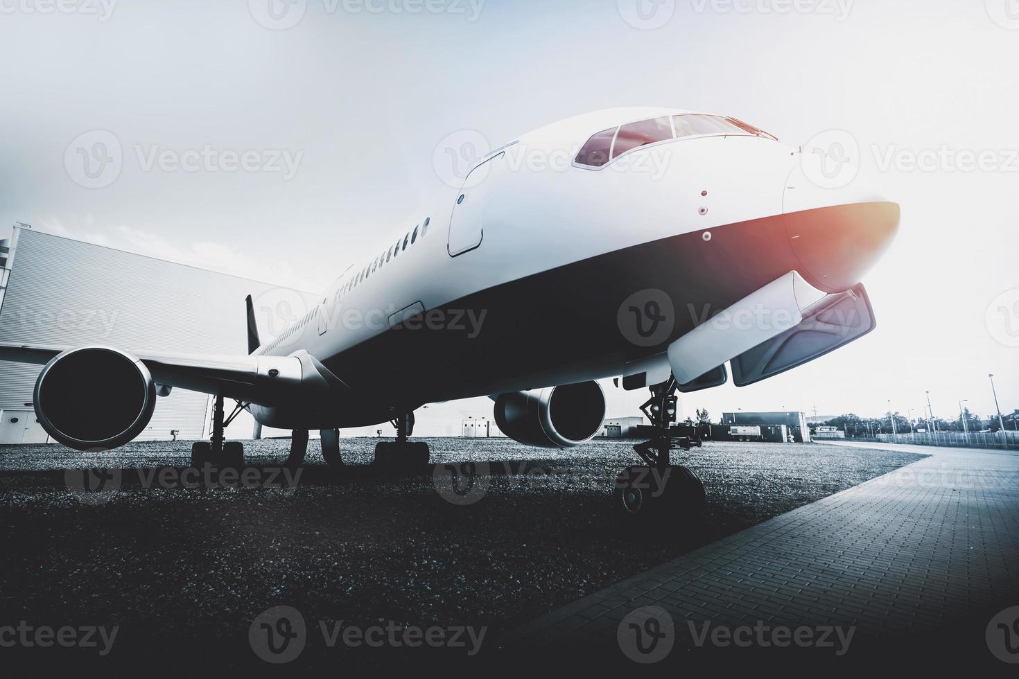 Airplane on the airport parking photo