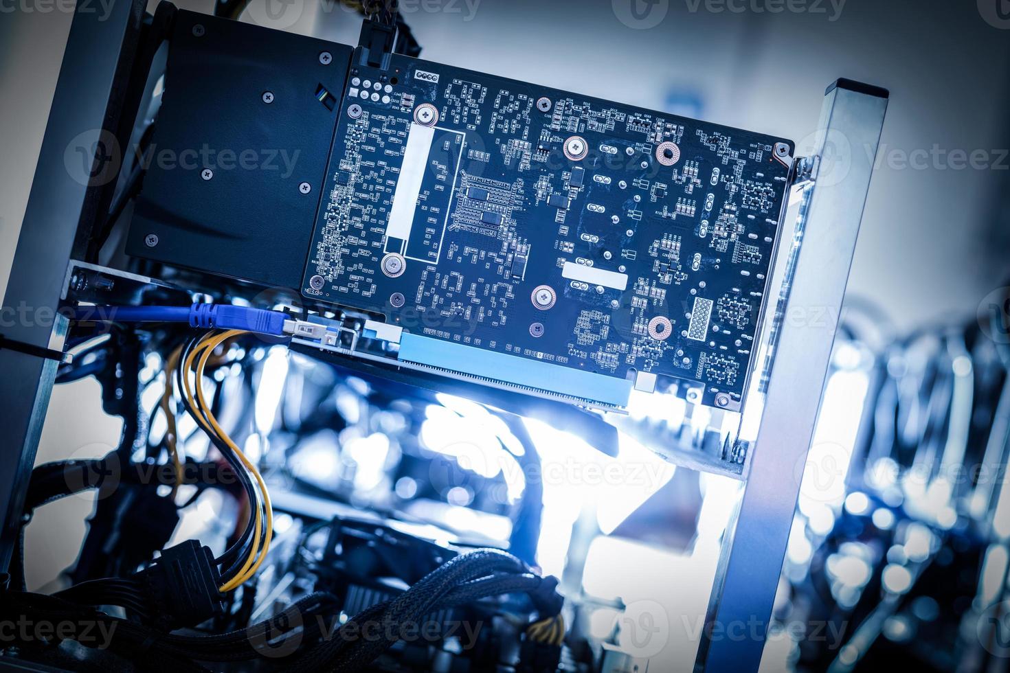 Fragment of cryptocurrency miner in a close-up shot. photo