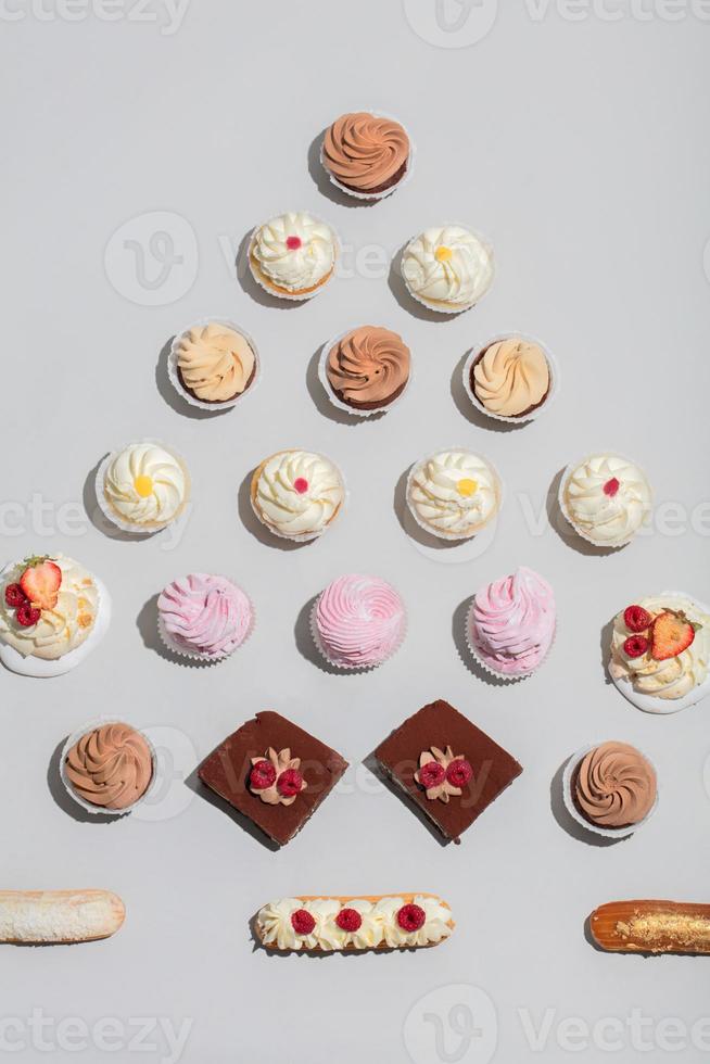 Different desserts composed in triangular shape photo