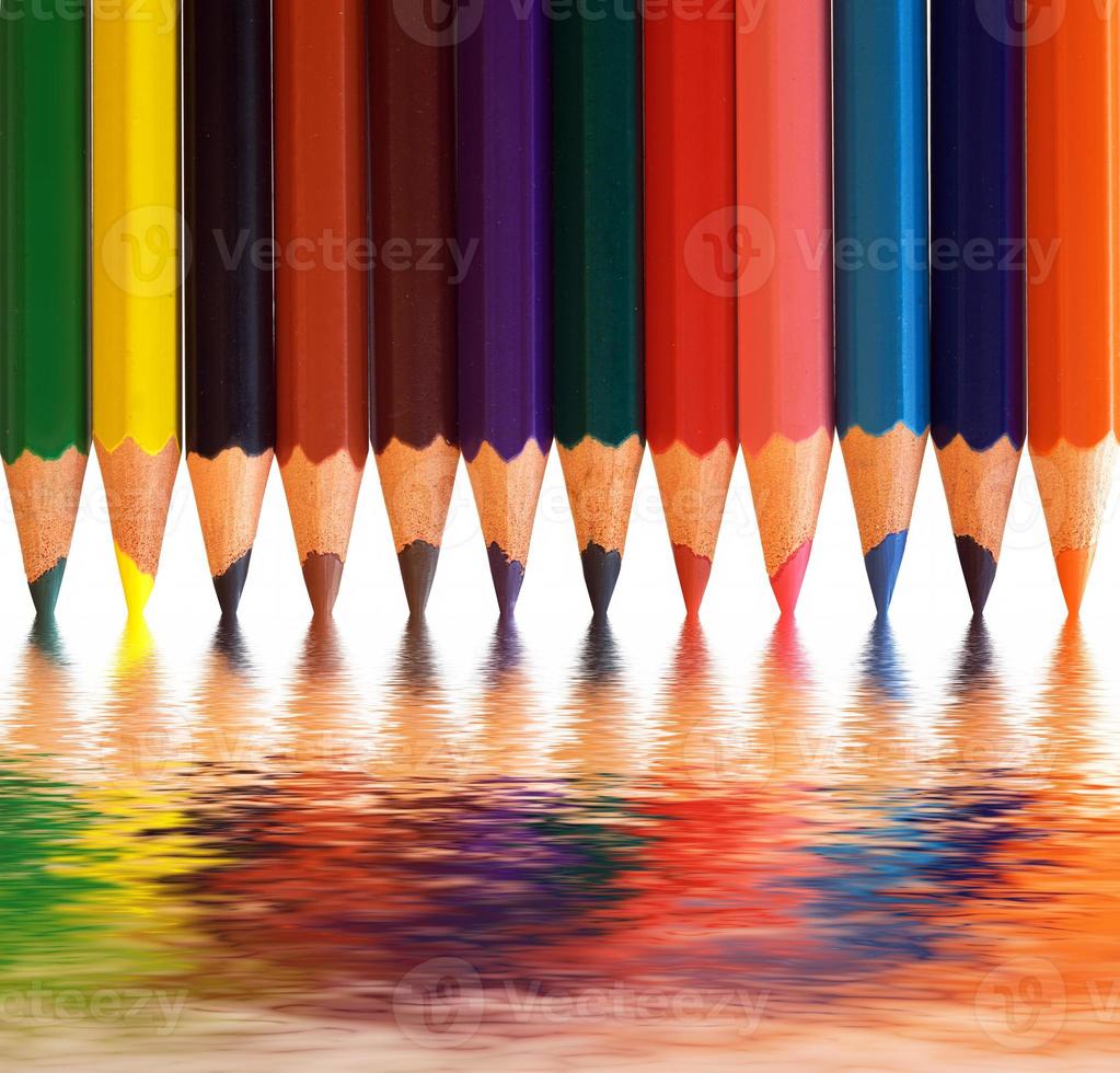 Colorful pencils with abstract reflection. Creative concepts. photo