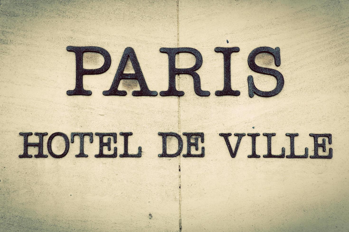 Paris, France, 2022 - Paris Hotel de Ville - Parisian city hall inscription on the building. Vintage photo