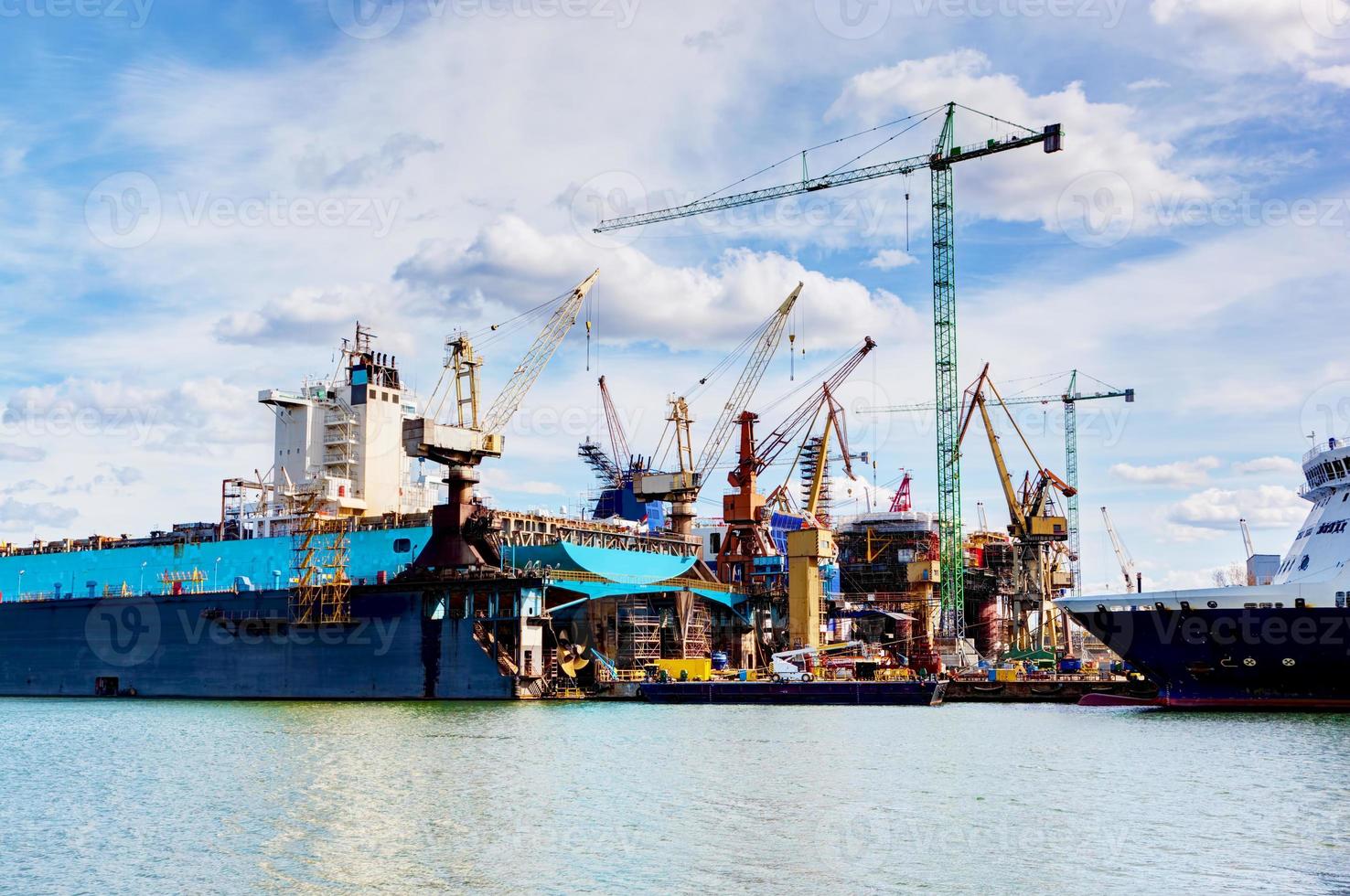 Shipyard. Ship under construction, repair. Industrial, transport. photo