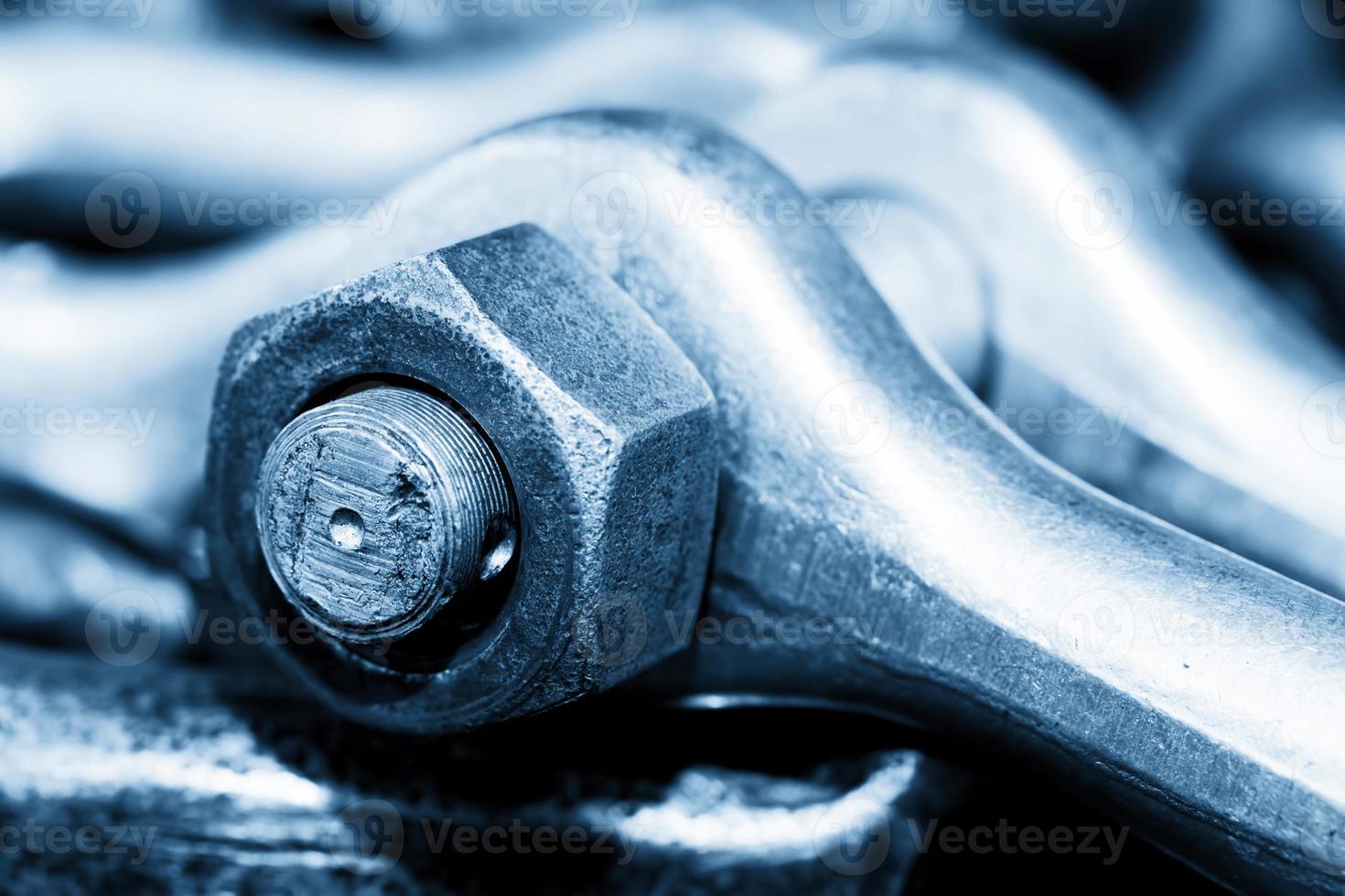 Industrial wrench, spanner in workshop. Industry theme. photo