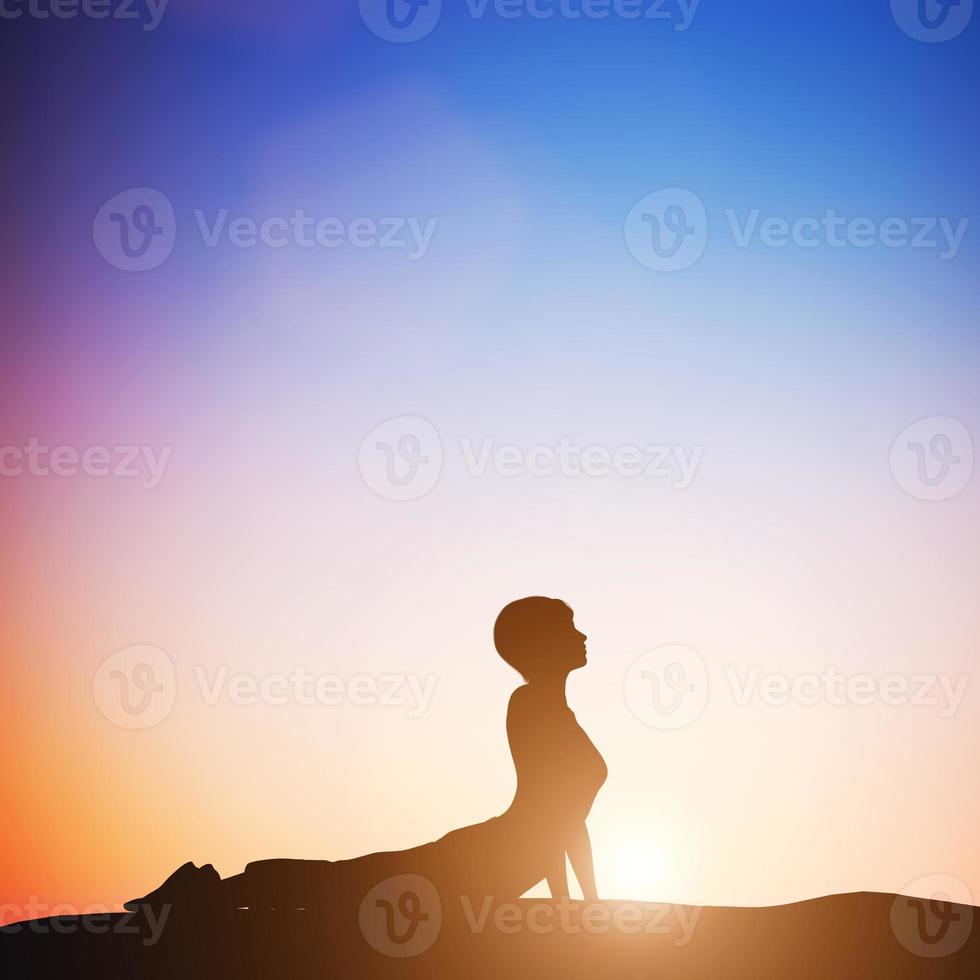 Woman in cobra yoga pose meditating at sunset. Zen photo