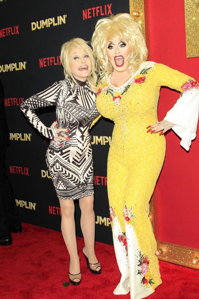 LOS ANGELES, DEC 6 - Dolly Parton, Jason Cosmo at the Dumplin Premiere at the TCL Chinese Theater on December 6, 2018 in Los Angeles, CA photo
