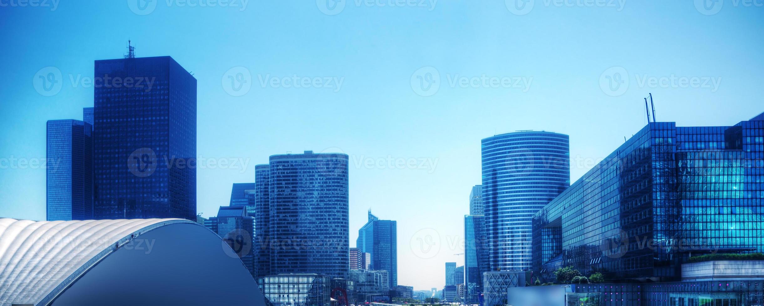 Business skyscrapers panorama in blue tint. Paris, France photo