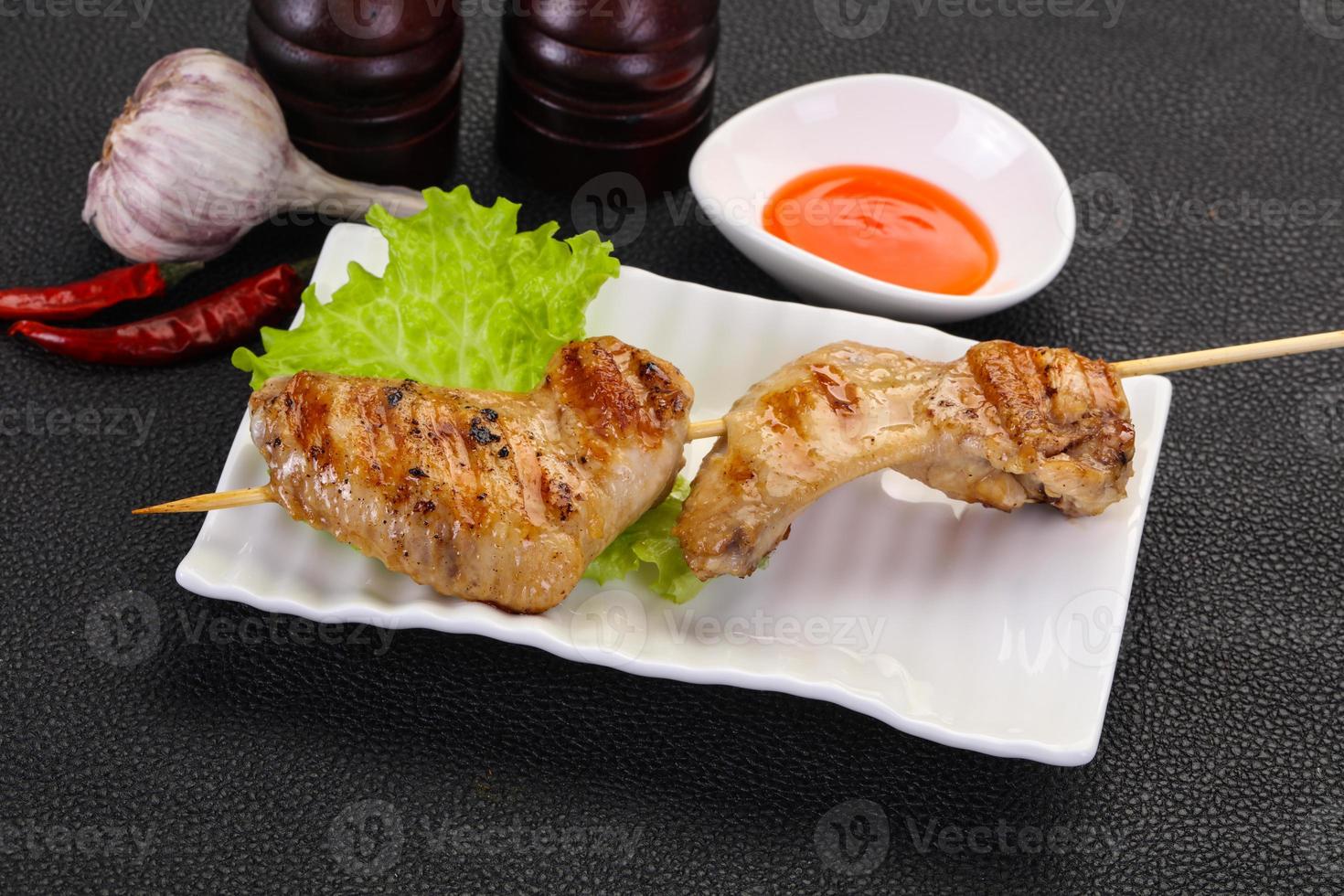 Chicken wings skewer photo