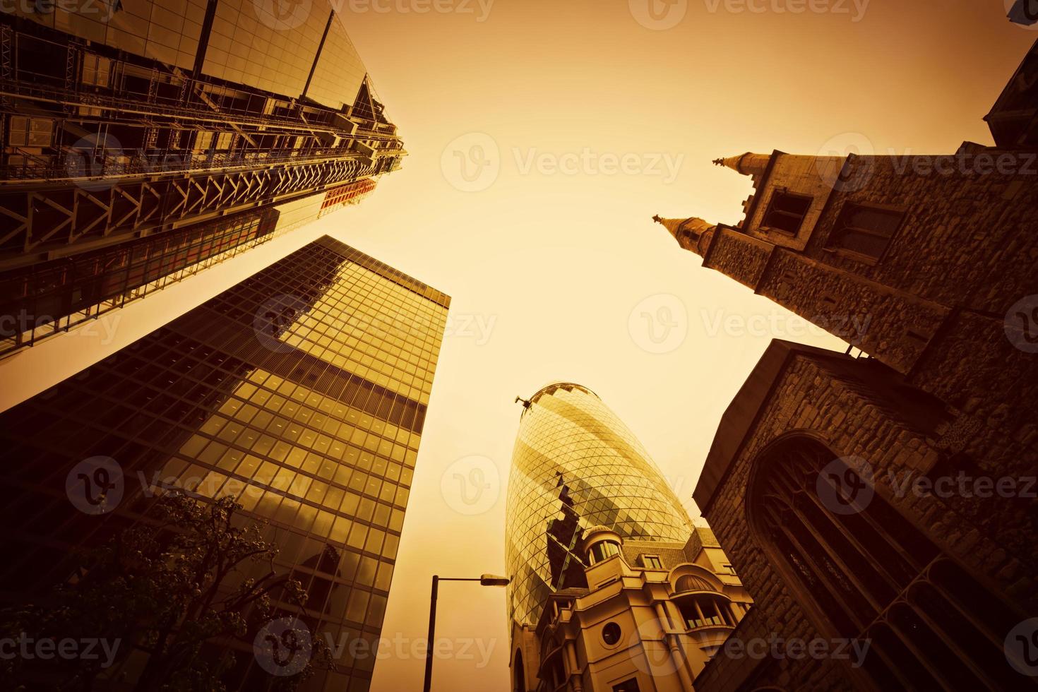 Business architecture, skyscrapers in London, the UK. Golden tint photo