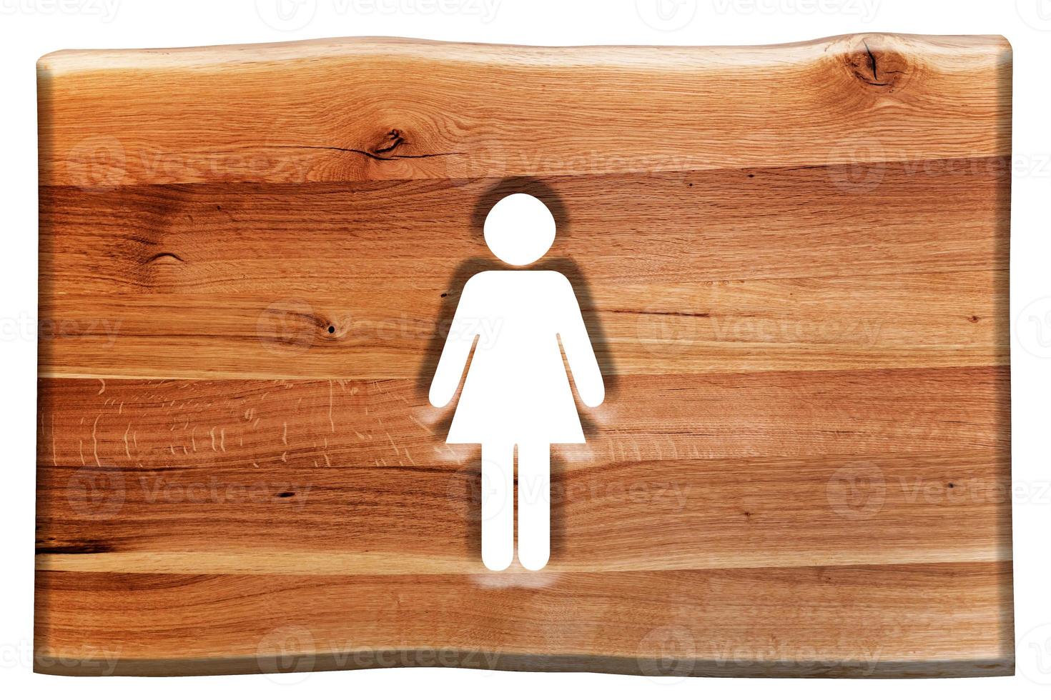 Woman symbol cut in wooden board isolated on white. photo