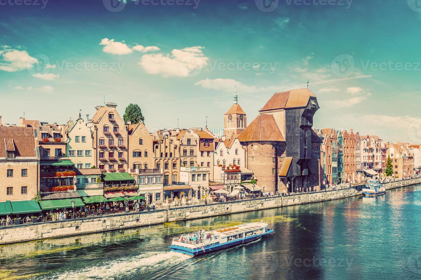 Gdansk old town and famous crane, Polish Zuraw. Motlawa river in Poland. Vintage photo