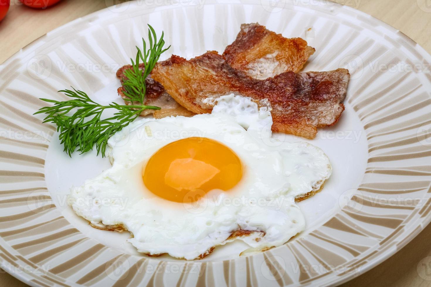 Breakfast - egg with bacon photo