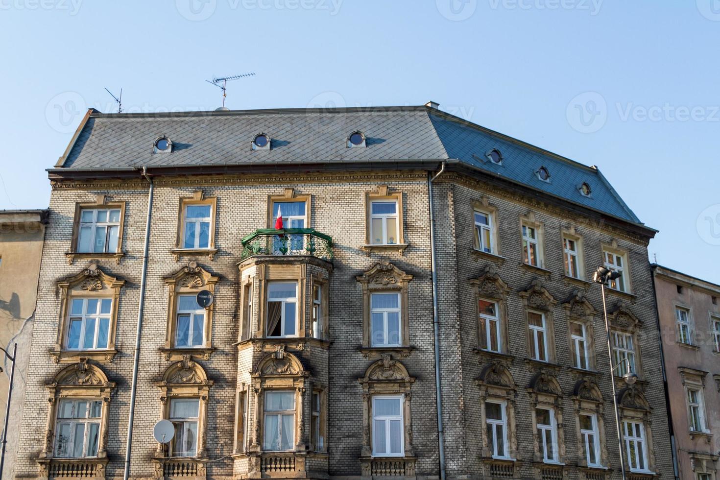 Beautiful facade of old town house in Krakow, Poland photo