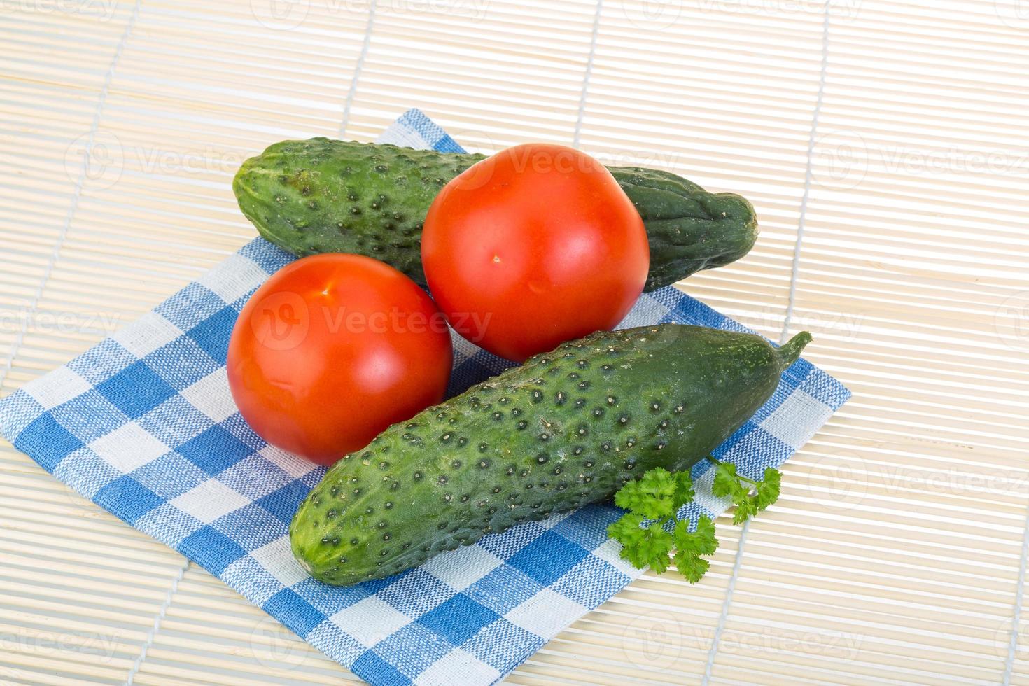 Tomato and cucumber photo