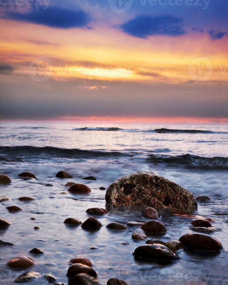 puesta de sol y mar foto