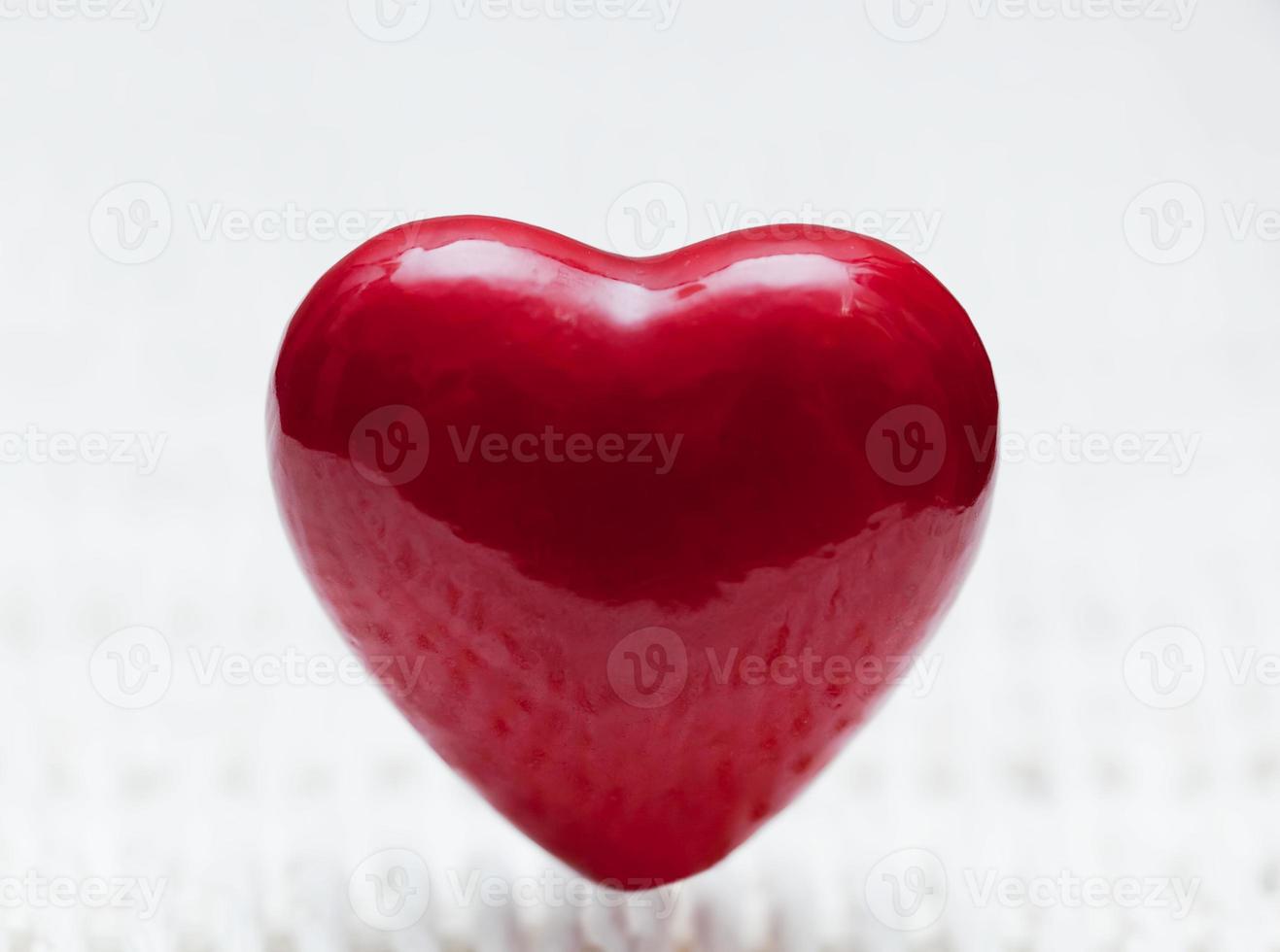 Red heart shape on wicker. Symbol of love photo