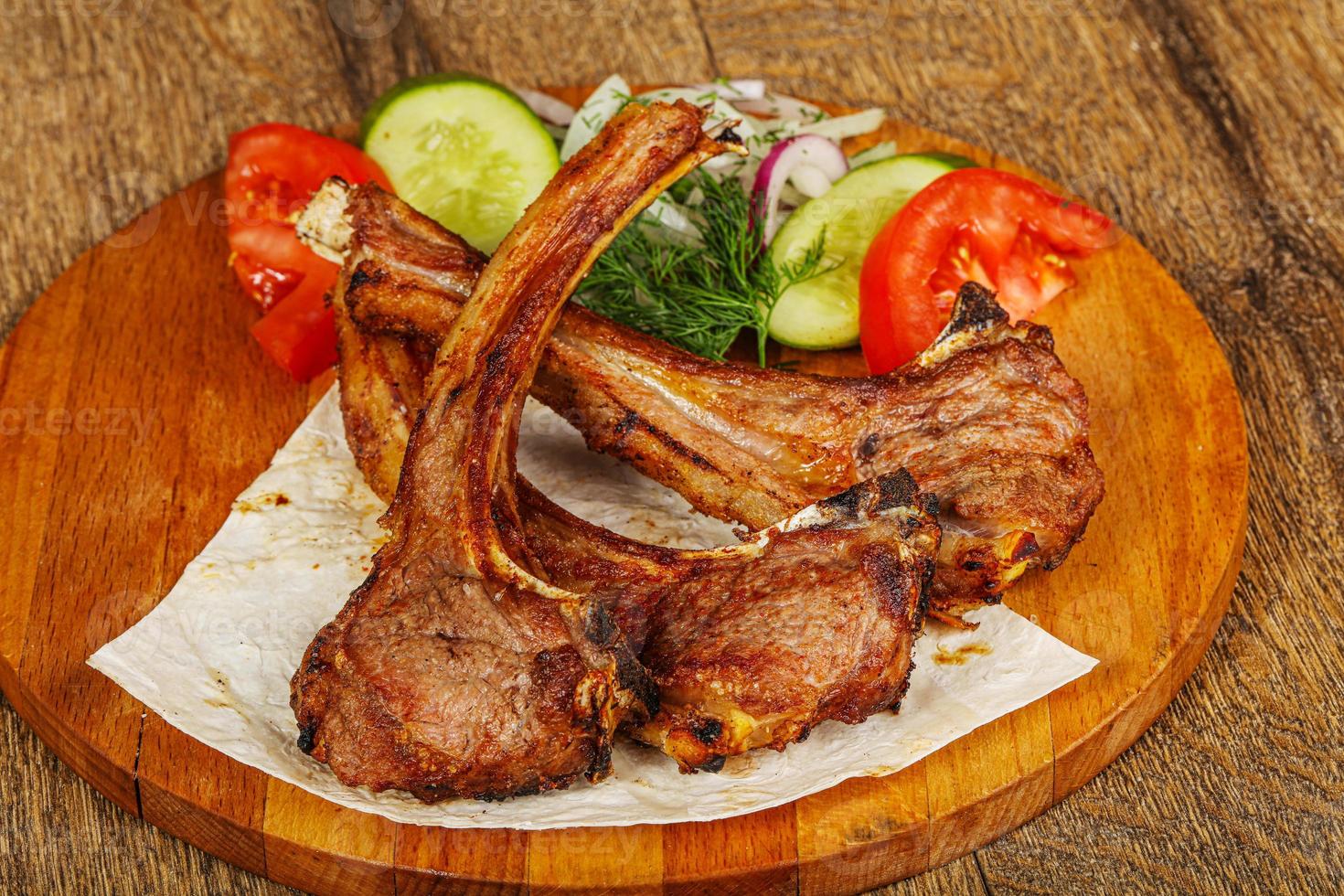 Grilled lamb barbeque served vegetables photo