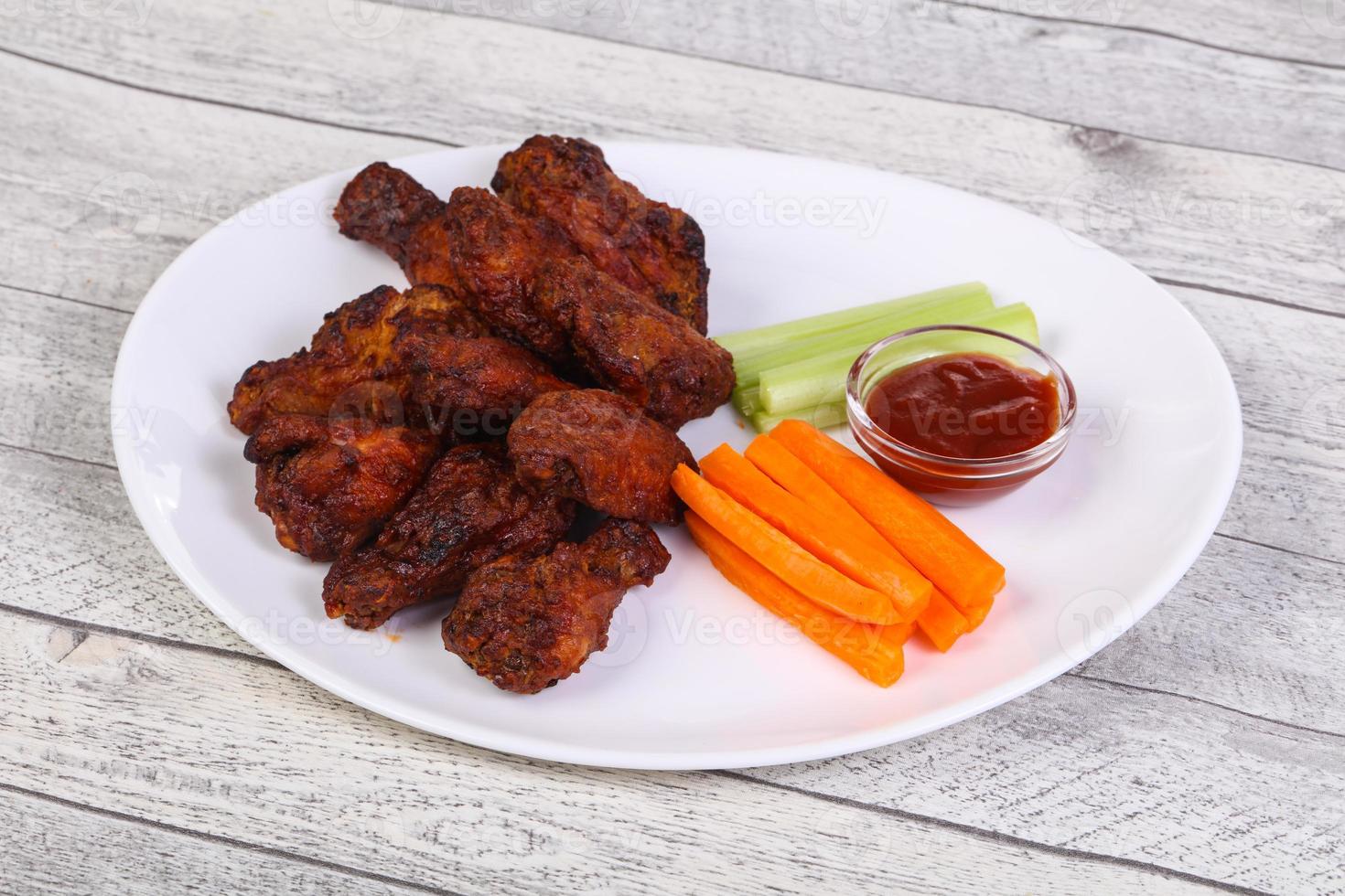Chicken wings bbq with celery and carrot 7844431 Stock Photo at Vecteezy
