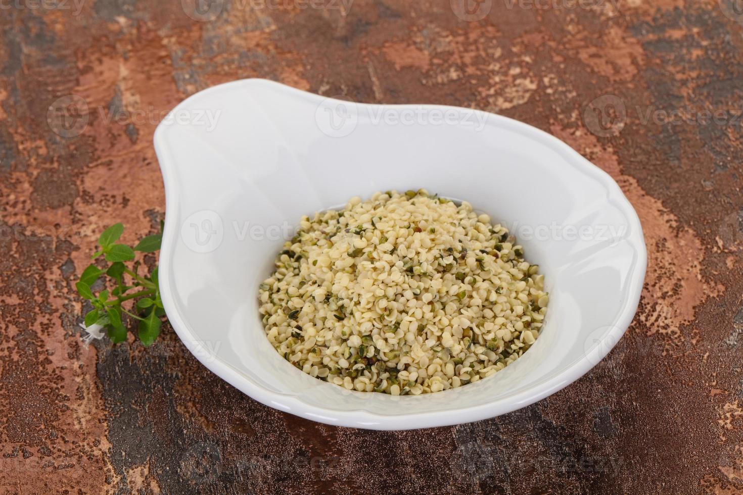 Peeled hemp seeds in the bowl photo