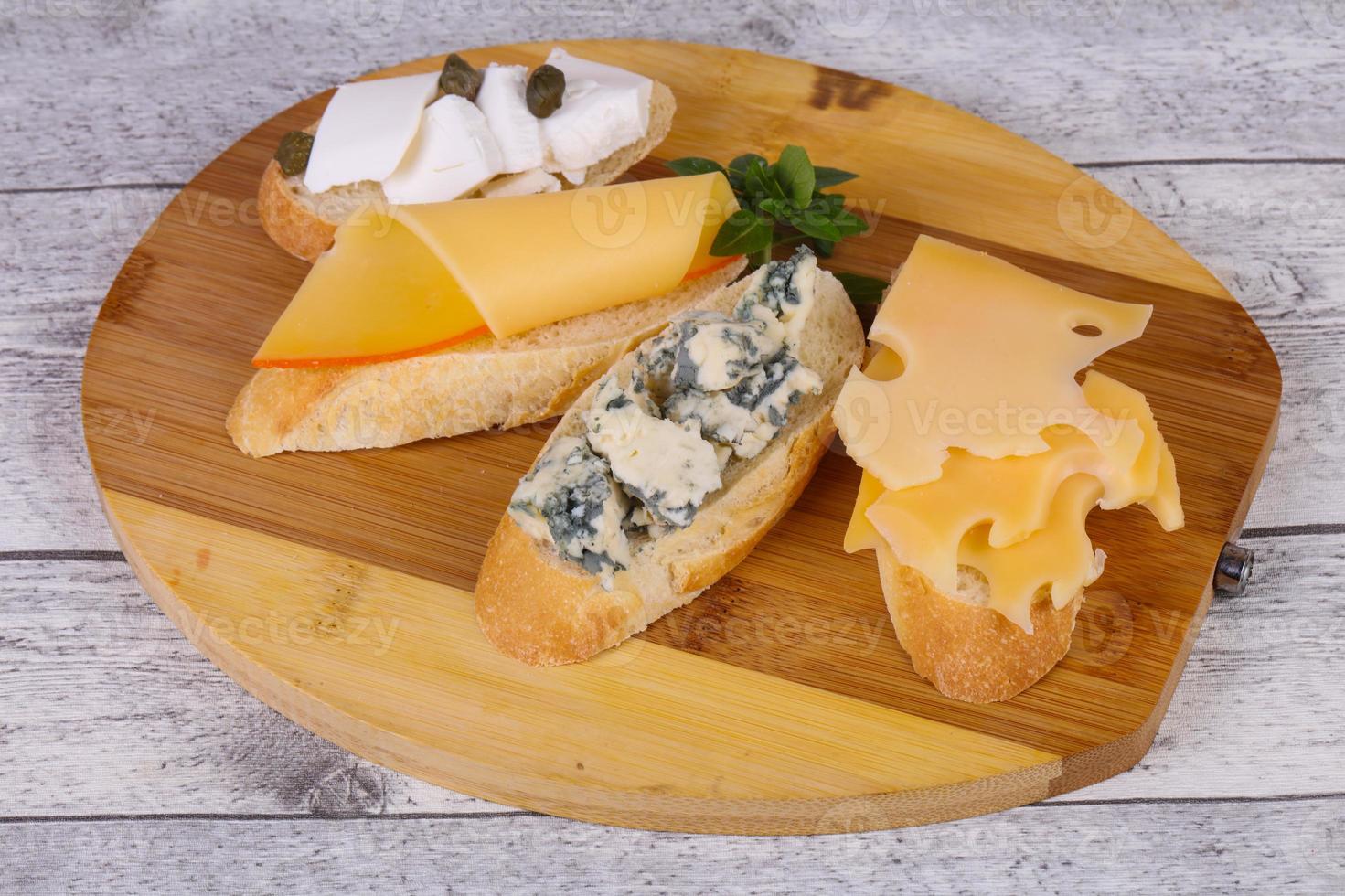 Bruschetta with various cheeses photo