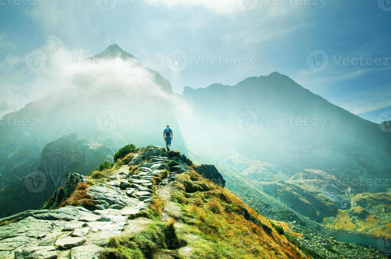 Person in mountain landscape photo