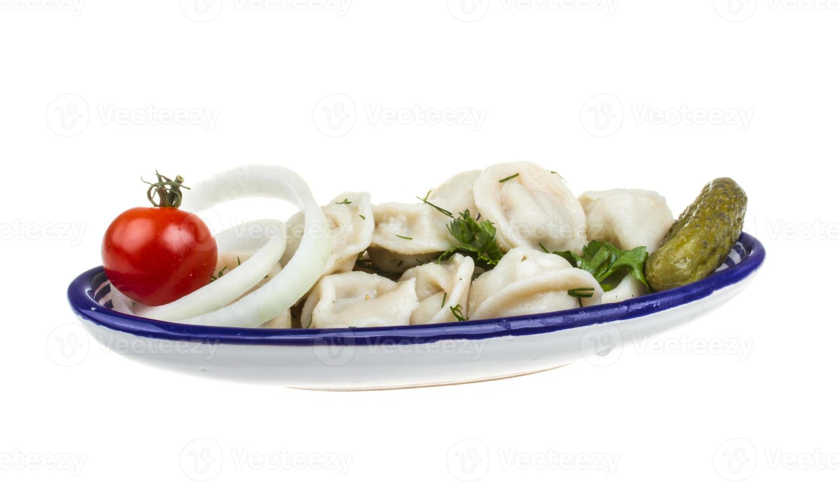 Bowl with traditional russian dish - pelmeni photo