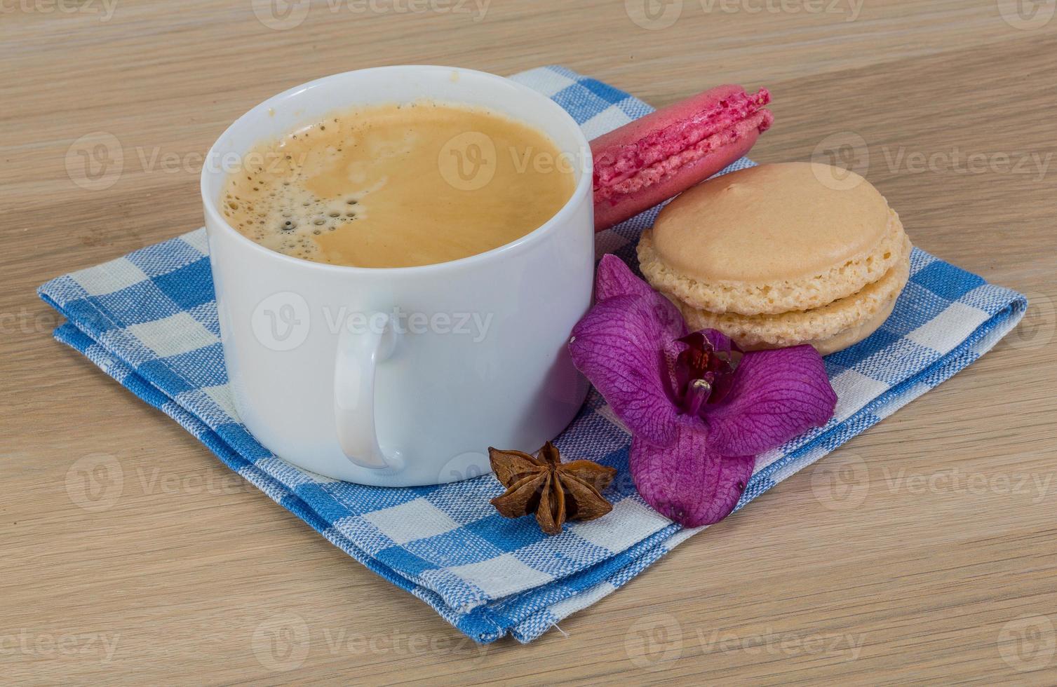 Capuccino with macaroons photo