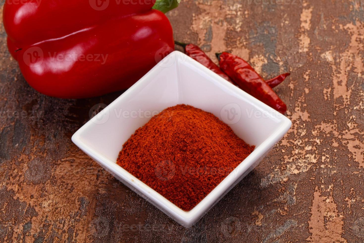 Paprika powder in the bowl photo