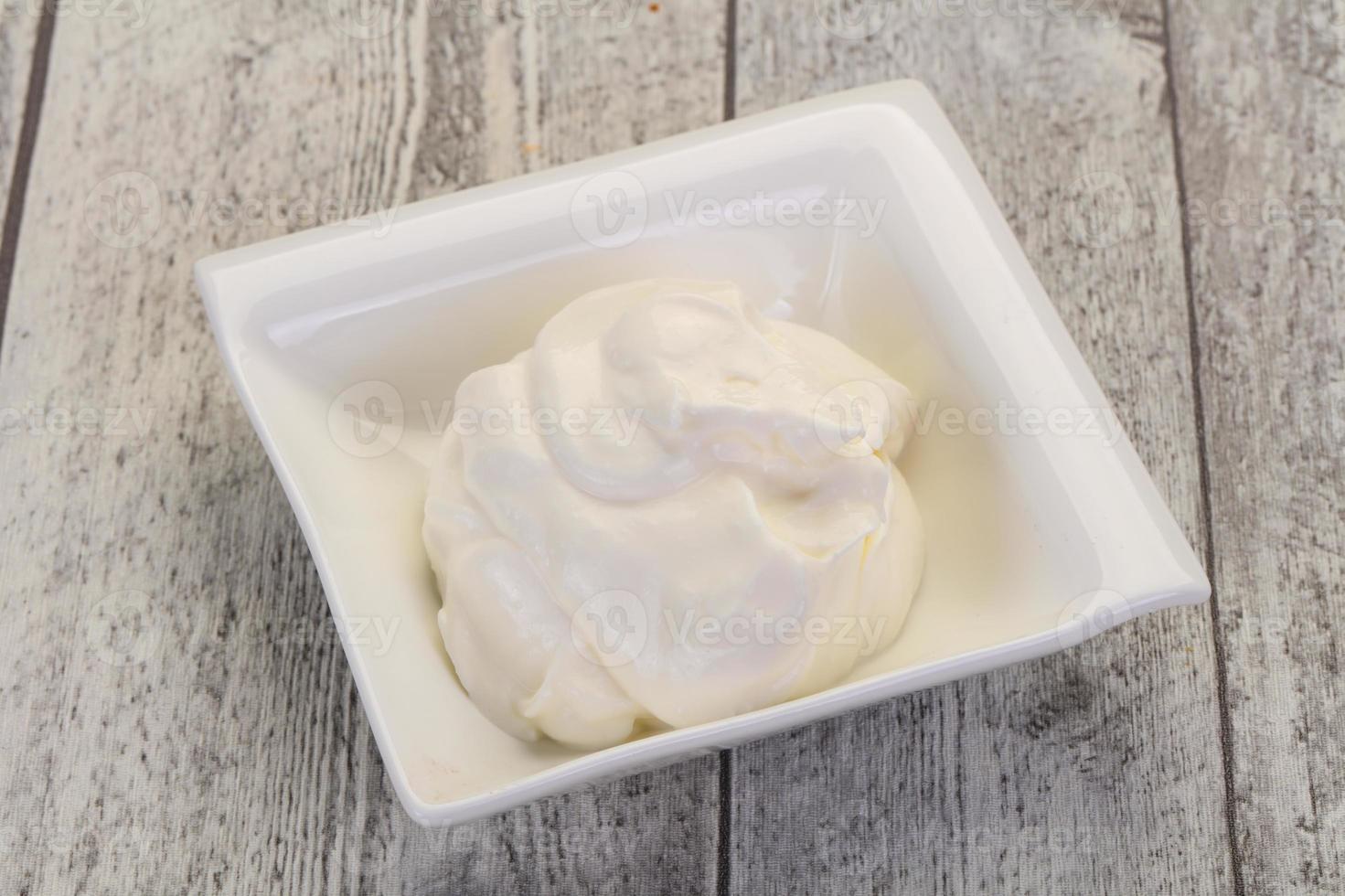 Sour cream in the bowl photo