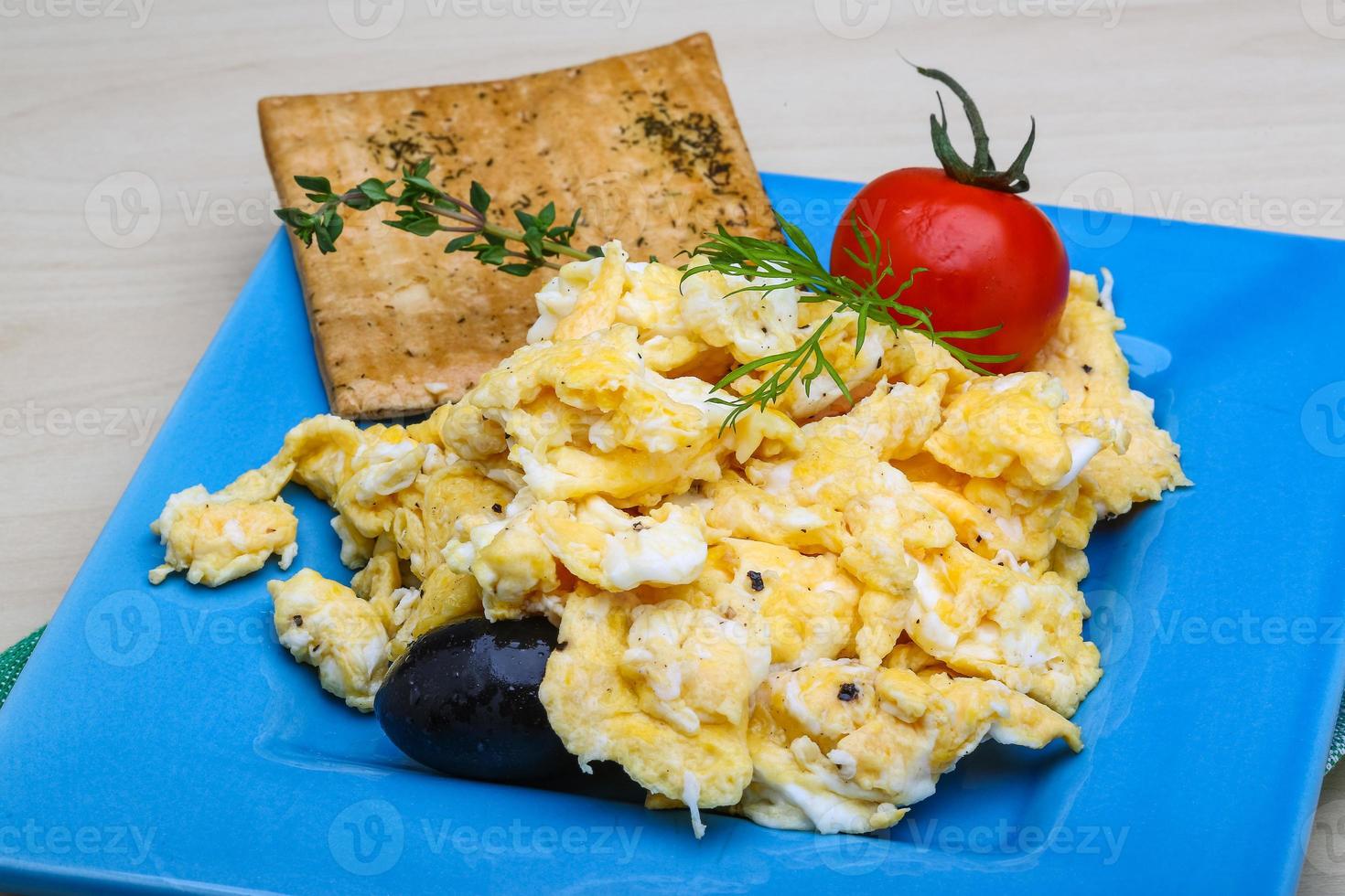 Scrambled eggs with tomato photo