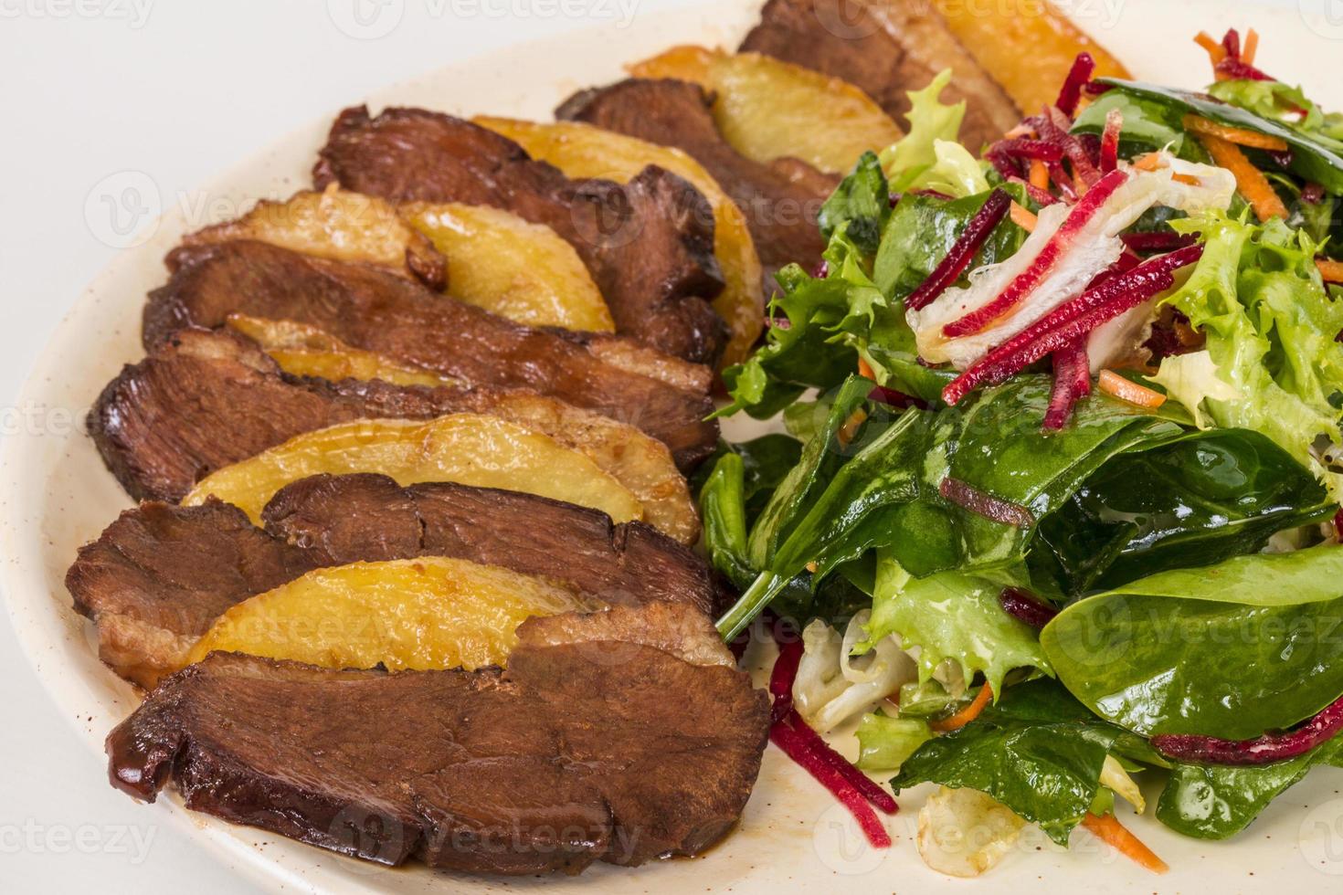 duck fillet, mashed potatoes seasoned with truffle oil, fig and aniseed sauce photo