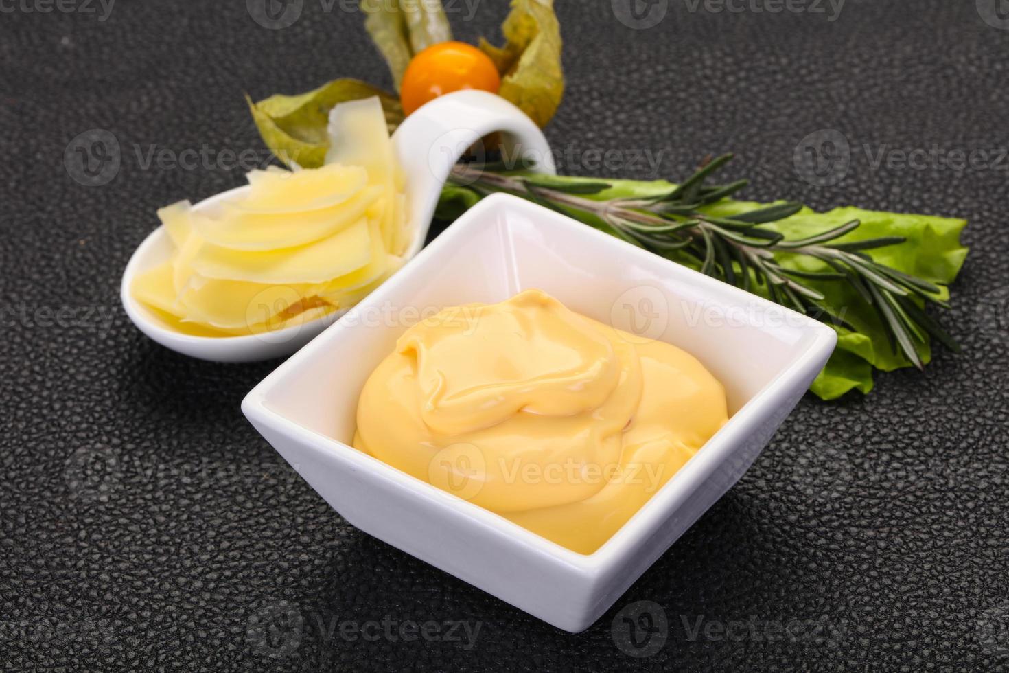 Cheese sauce in the bowl photo