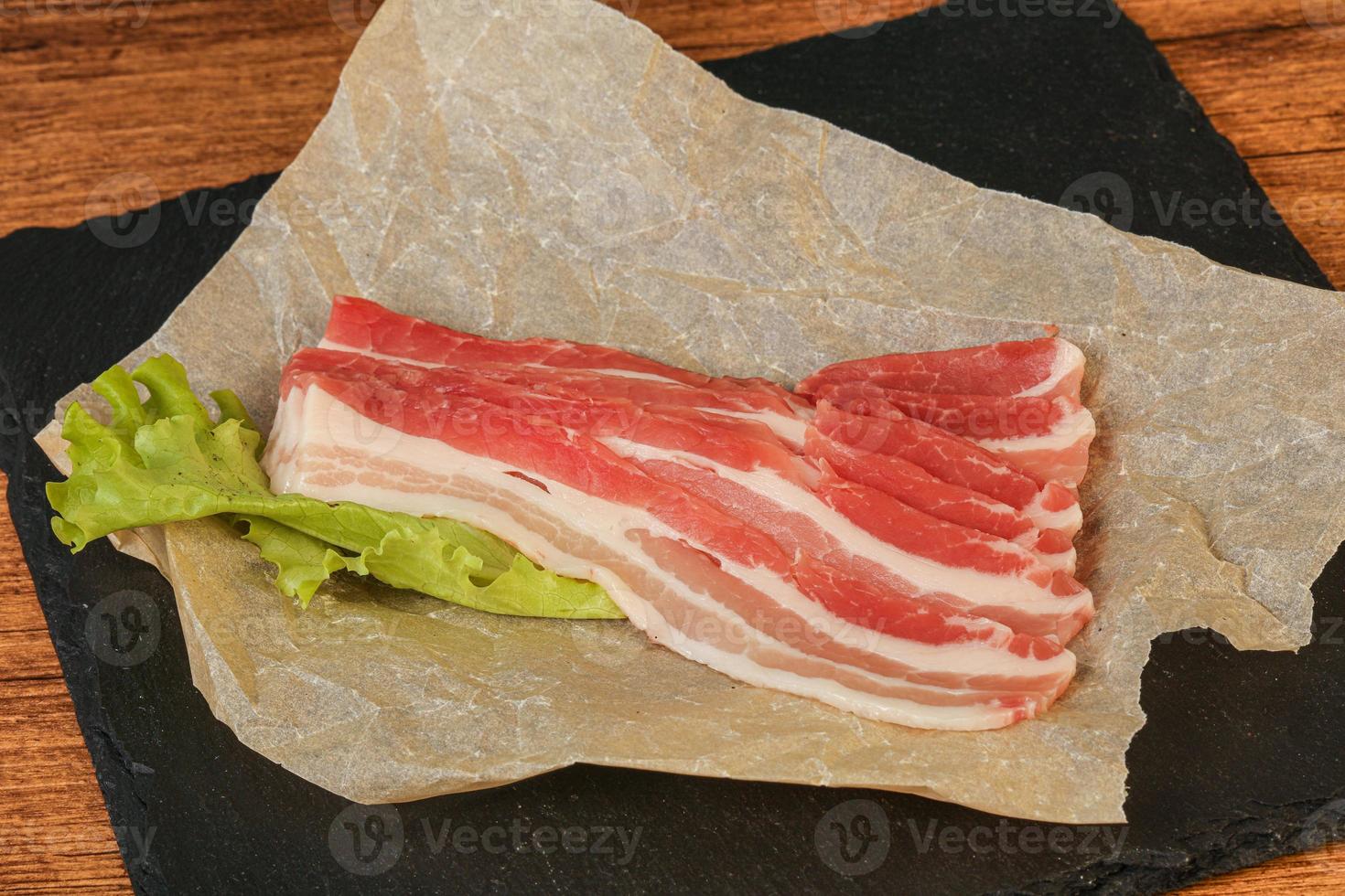 Raw pork bacon for roast photo