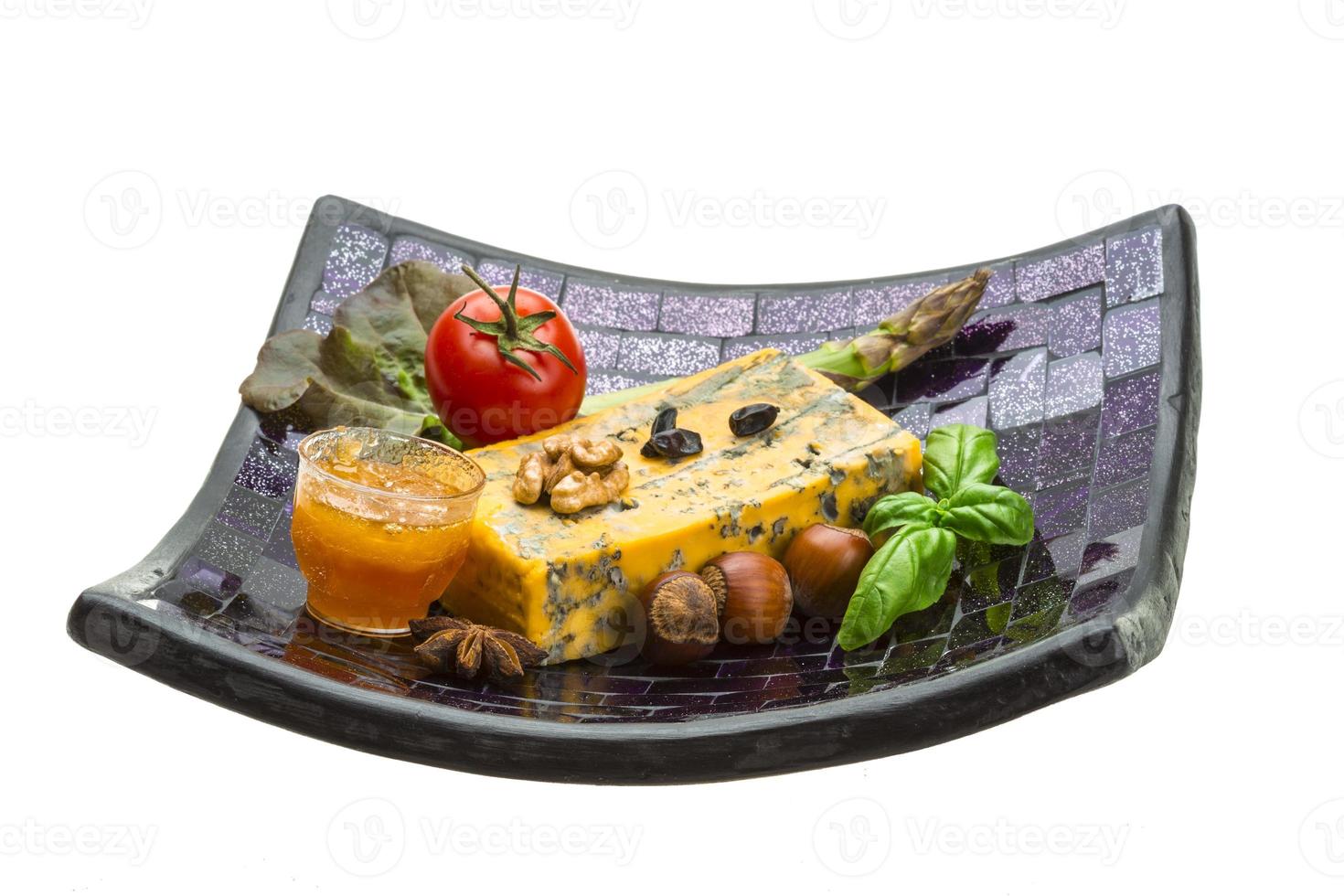 Gold cheese with mould photo