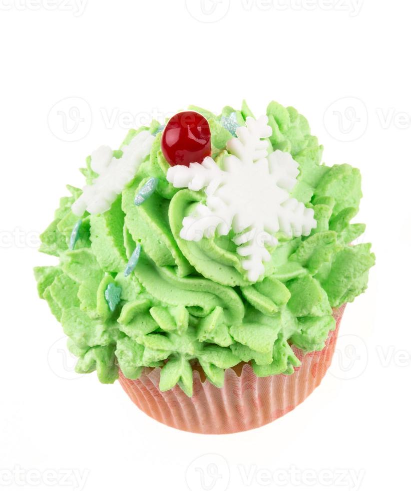 Studio isolated creamy green cupcake photo