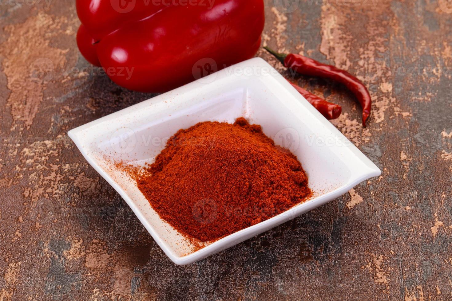 Paprika powder in the bowl photo