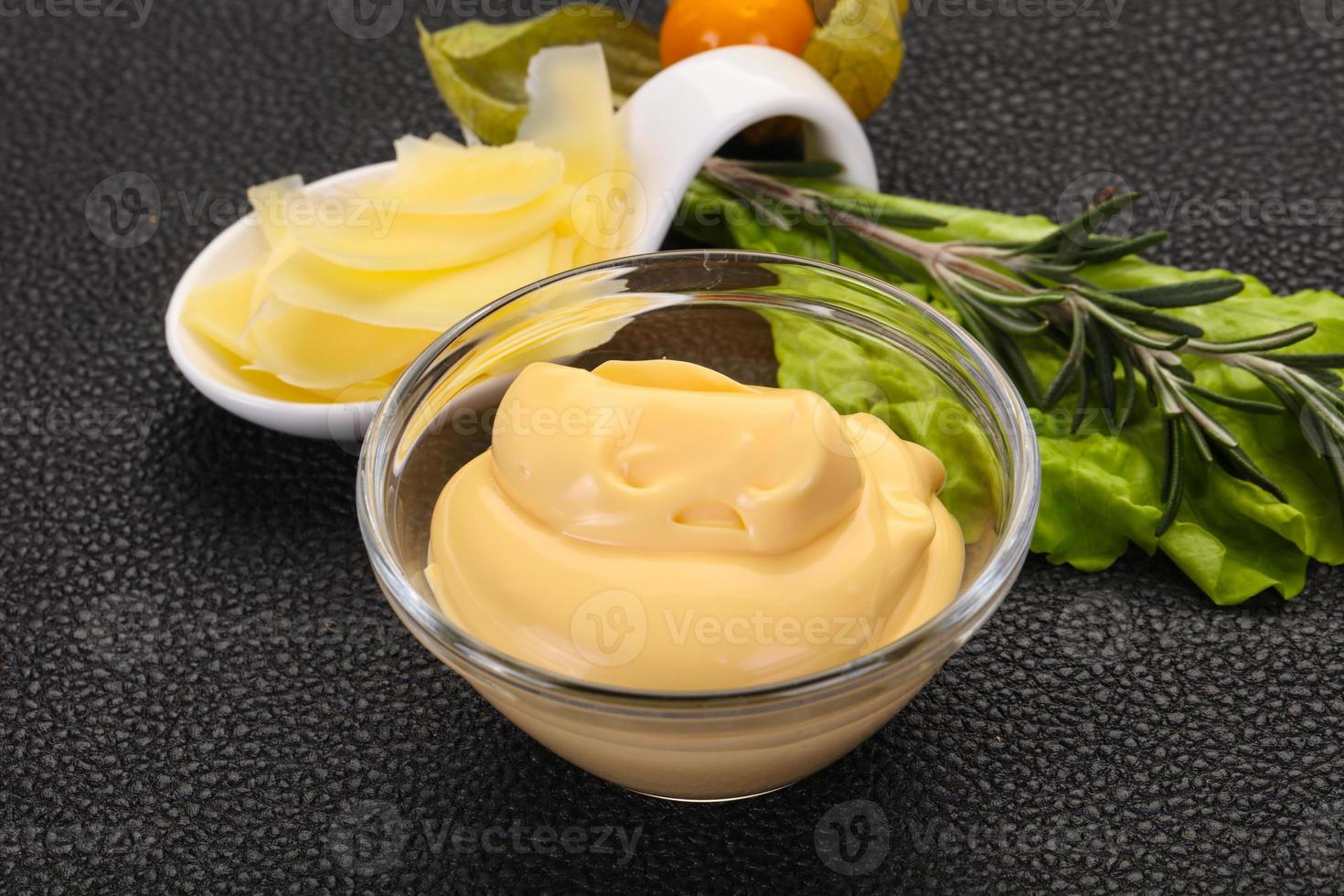 Cheese sauce in the bowl photo