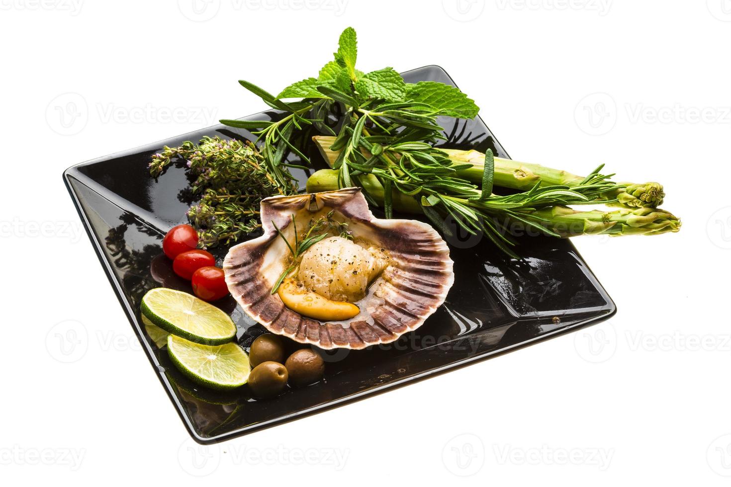 Scallop with asparagus, lime, mint and rosemary photo