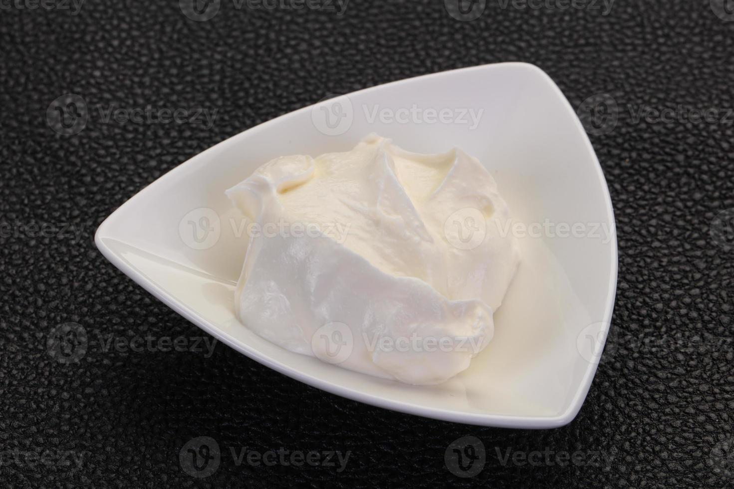 Sour cream in the bowl photo