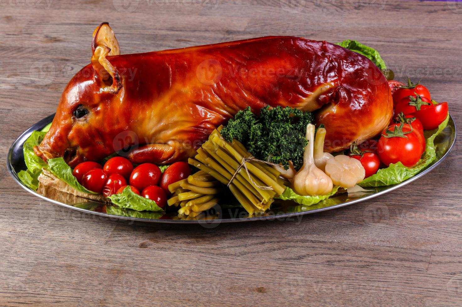 Grilled young pig photo